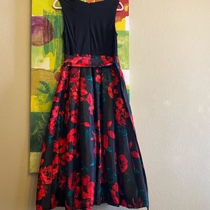 Formal dress size 12 , color black floral new with tag